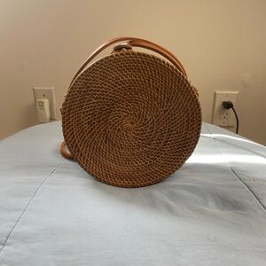 Round Woven Crossbody Bag in Brown